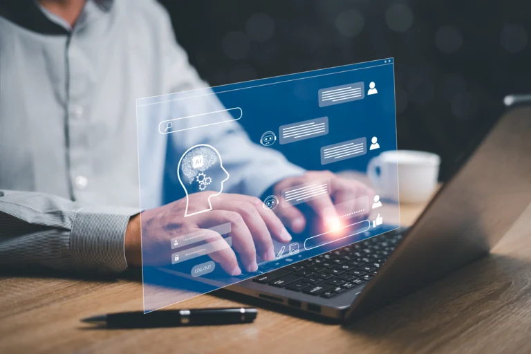 Person using a laptop with AI chatbot interface on screen, symbolizing the use of ChatGPT for productivity or ADHD support.