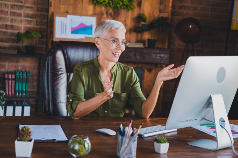 Woman with ADHD participating in a virtual job interview on her desktop