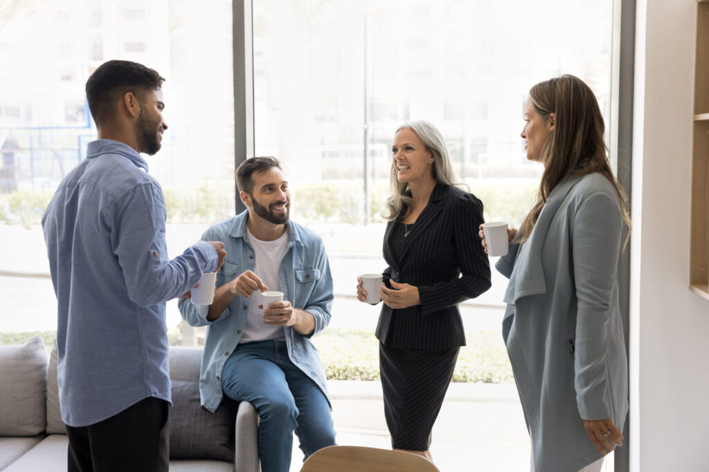 An adult with ADHD processing a group conversation in a casual office setting