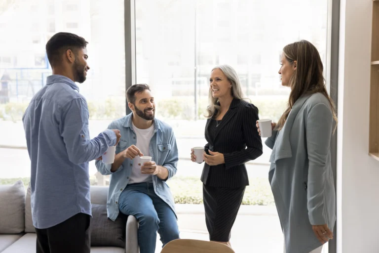 An adult with ADHD processing a group conversation in a casual office setting