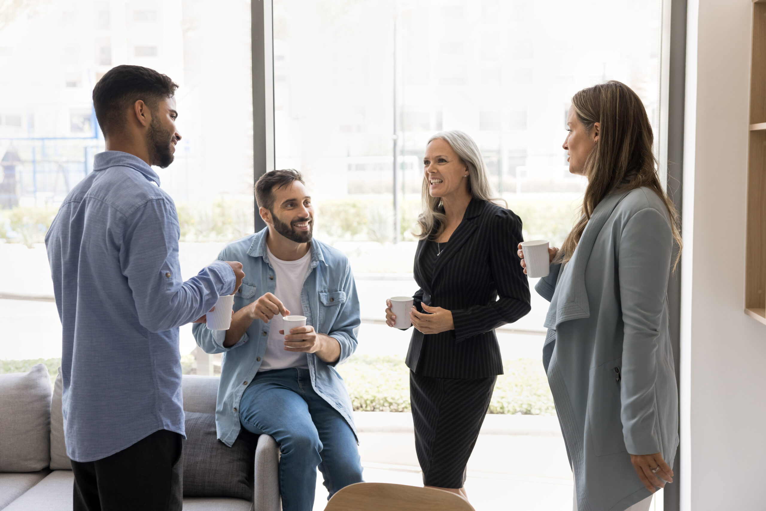 An adult with ADHD processing a group conversation in a casual office setting