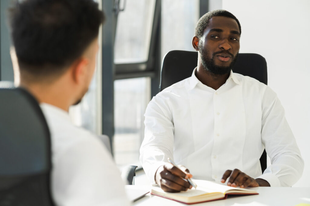 An employee with ADHD talks to their manager about getting support at work